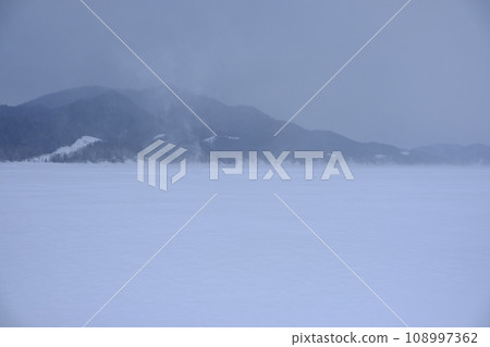 Scenery seen from the frozen surface of Lake Nukabira in winter Scenery seen from the frozen surface of Lake Nukabira in winter 108997362