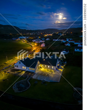 Aerial night view of Glencolumbkille in County Donegal, Republic of Irleand Aerial night view of Glencolumbkille in County Donegal, Republic of Irleand 108998332