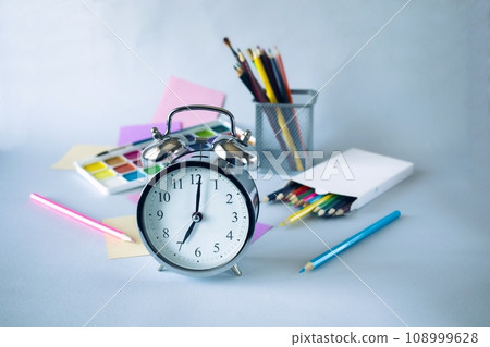 Back to school, watercolor paints, brushes and colored pencils, palette, school supplies on a gray background 108999628