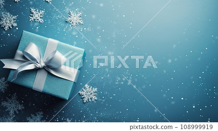 Christmas decorations on blue background, top view with space for text Christmas decorations on blue background, top view with space for text 108999919