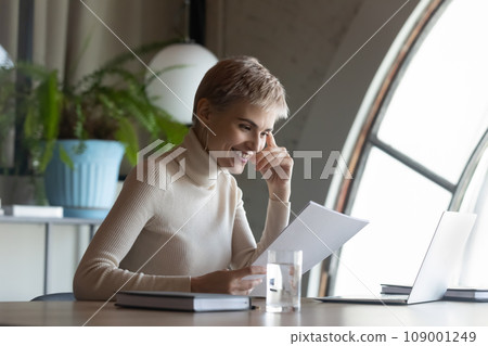 Happy confident business woman, professional, assistant, reading documents Happy confident business woman, professional, assistant, reading documents 109001249