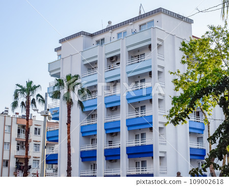 Blue balconies. Balconies of a residential high-rise building. Residential Blue balconies. Balconies of a residential high-rise building. Residential 109002618