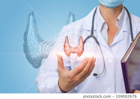 The doctor shows the thyroid gland . The doctor shows the thyroid gland . 109002676