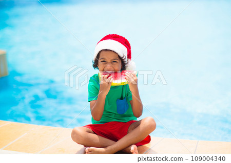 Christmas vacation on tropical island. Xmas kids. 109004340