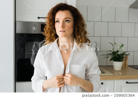 Close-up woman wearing beautiful luxury big necklace. Handmade jewellery and accessories 109005364