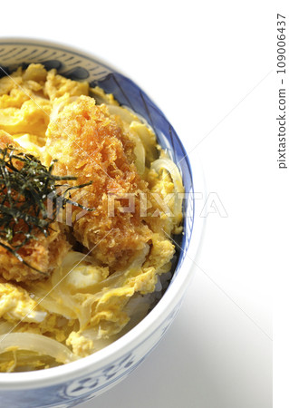 Overhead shot of fried oysters and egg tojidon against a white background Overhead shot of fried oysters and egg tojidon against a white background 109006437