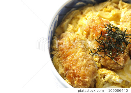 Overhead shot of fried oysters and egg tojidon against a white background Overhead shot of fried oysters and egg tojidon against a white background 109006440