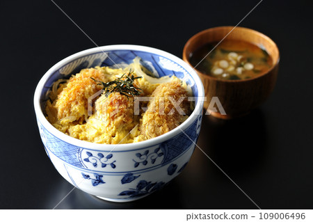 Fried oysters with egg and miso soup with seaweed and green onion Fried oysters with egg and miso soup with seaweed and green onion 109006496