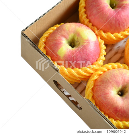 beautiful pink apple in the box on white background 109006942