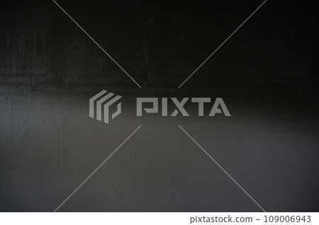 dirty black wall was burn from fire, construction industry 109006943