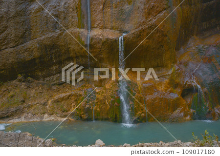 Scenic view of trees and river in the mountains in autumn 109017180