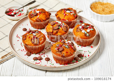 Christmas sweet potato muffin topped with holiday sprinkles Christmas sweet potato muffin topped with holiday sprinkles 109018174