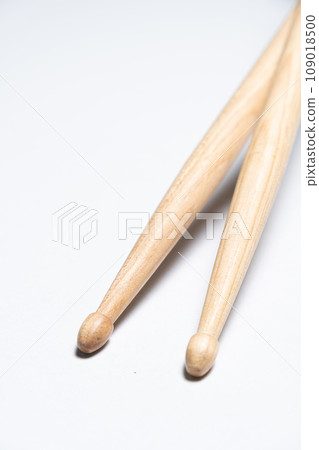 Wooden drum sticks on white background. 109018500