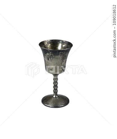 Ancient chalice made of silver on white background 109018612