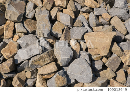 Gravel texture. Pebble stone background. Light grey closeup small rocks. Top view of ground gravel road. 109018649
