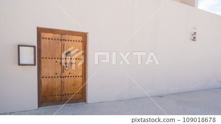 Old gate in the old district of Sharjah city. Place for text. 109018678