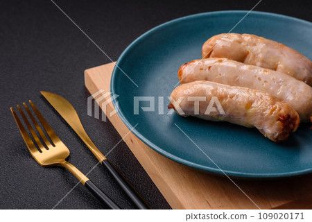 Delicious grilled chicken or pork sausages with salt, spices and herbs 109020171
