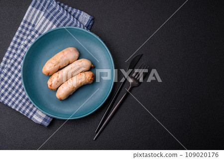 Delicious grilled chicken or pork sausages with salt, spices and herbs Delicious grilled chicken or pork sausages with salt, spices and herbs 109020176