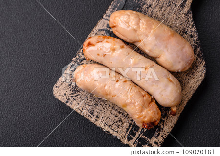 Delicious grilled chicken or pork sausages with salt, spices and herbs 109020181