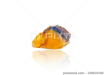 Macro mineral stone Fluorite yellow and blue color on a white background Macro mineral stone Fluorite yellow and blue color on a white background 109020398