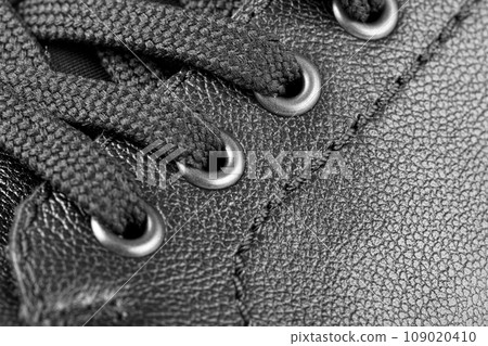 black leather texture with stitching 109020410