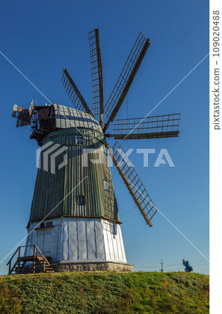 windmill dutch type against blue sky 109020488