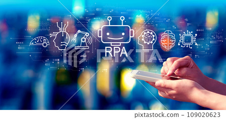 Robotic Process Automation theme with person using a smartphone at night Robotic Process Automation theme with person using a smartphone at night 109020623