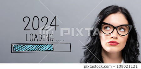 Loading new year 2024 with young businesswoman Loading new year 2024 with young businesswoman 109021121