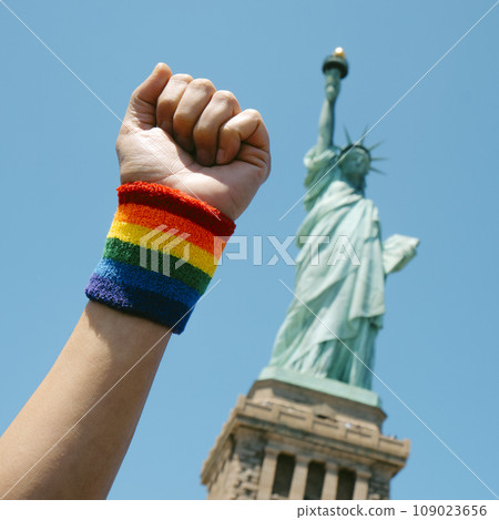 rainbow flag in front of the Statue of Liberty rainbow flag in front of the Statue of Liberty 109023656