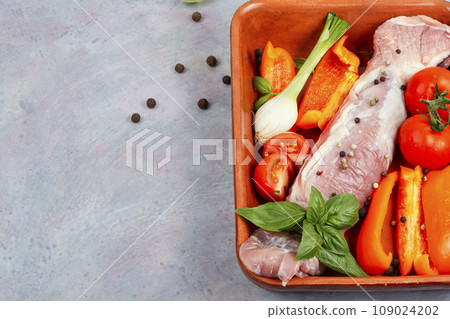 Raw pork tenderloin for preparation. 109024202