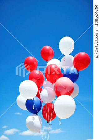 balloons in patriotic colors floating against a bright blue sky balloons in patriotic colors floating against a bright blue sky 109024684