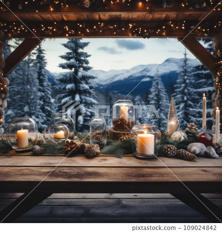 A rustic wooden table with Christmas decorations and candles 109024842