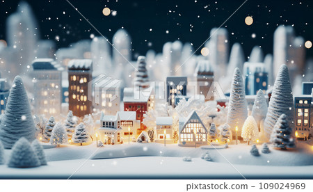 Christmas miniature town, little village illuminated model. Scene of cozy snowy houses, toy buildings, trees with snow, snowfall composition. New Year background. Winter magical greeting card concept 109024969