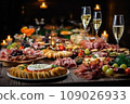 Light snacks in a plate on a buffet table. Assorted mini canapes, delicacies and snacks, restaurant food at event. A gala reception. Decorated delicious table for a party goodies. 109026933