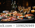 Light snacks in a plate on a buffet table. Assorted mini canapes, delicacies and snacks, restaurant food at event. A gala reception. Decorated delicious table for a party goodies. 109026949