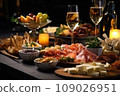 Light snacks in a plate on a buffet table. Assorted mini canapes, delicacies and snacks, restaurant food at event. A gala reception. Decorated delicious table for a party goodies. 109026951