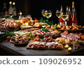 Light snacks in a plate on a buffet table. Assorted mini canapes, delicacies and snacks, restaurant food at event. A gala reception. Decorated delicious table for a party goodies. 109026952
