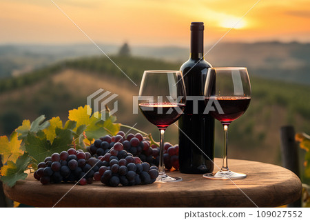 Glass of wine against the backdrop of a vineyard 109027552