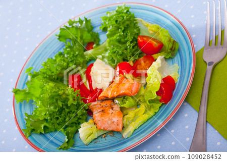 Grilled trout with vegetables Grilled trout with vegetables 109028452