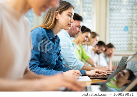 Woman using laptop during lesson in university Woman using laptop during lesson in university 109029051