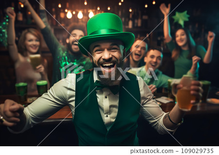 Young people are having fun, wearing green costumes and celebrating St. Patrick's Day in a bar 109029735