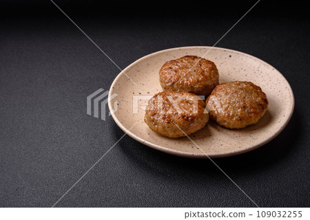 Delicious fresh fried minced fish cutlets with spices and herbs 109032255