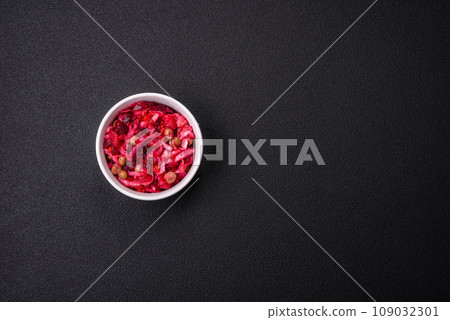 Delicious juicy vinigret salad of boiled vegetables potatoes, beets, pot, cabbage and carrots 109032301