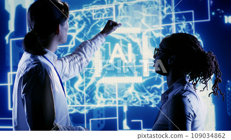 Skilled executives looking at artificial intelligence human brain simulation hologram. Knowledgeable professionals brainstorming ways to harness AI technology power, interacting with AR visualization Skilled executives looking at artificial intelligence human brain simulation hologram. Knowledgeable professionals brainstorming ways to harness AI technology power, interacting with AR visualization 109034862