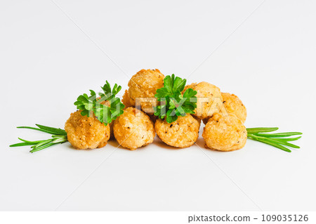 Breaded Chicken nuggets Fillet with salad on a White Background,food at home. Fast homemade food.Chicken breaded schnitzels. Breaded Chicken Inner Fillet, Chicken Breaded Raw Meat. Fast cooking. 109035126
