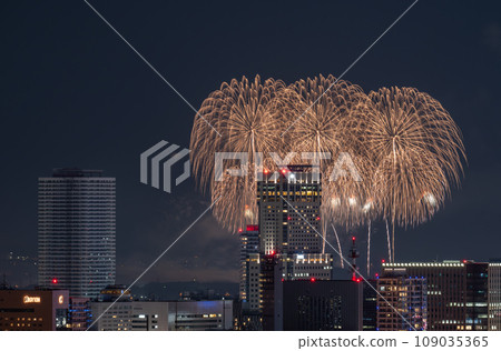 City night view and fireworks lighting up skyscrapers 109035365