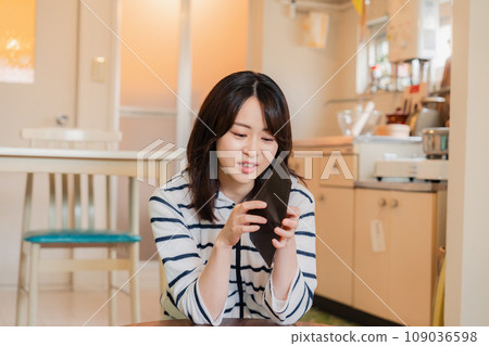 A depressed young woman checking inside her wallet A depressed young woman checking inside her wallet 109036598