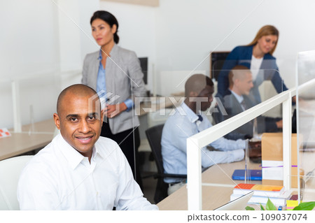 Successful latin american businessman looking at camera at workplace 109037074