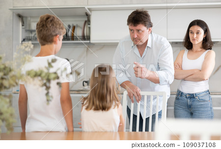 Parents scold their children in kitchen at home 109037108