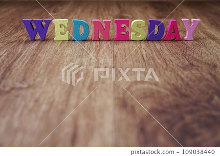 wednesday alphabet letter with space copy on wooden background wednesday alphabet letter with space copy on wooden background 109038440